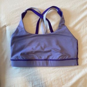 A purple stripped sportsbra from lululemon, size 4
